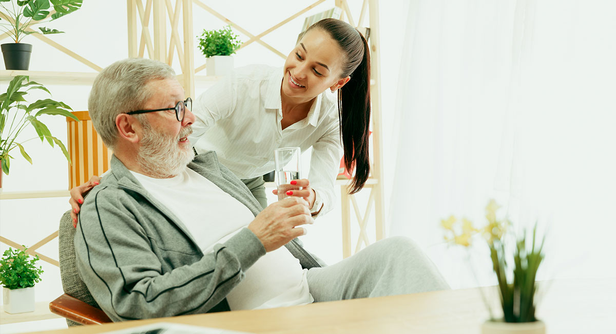 A carer providing elderly homecare service to a senior person