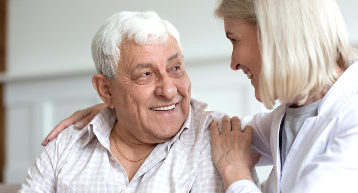 An elderly man suffering from Alzheimer's disease is receiving homecare