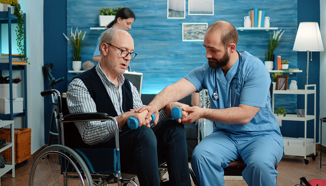 A caregiver listening to an elderly woman express her concerns about life